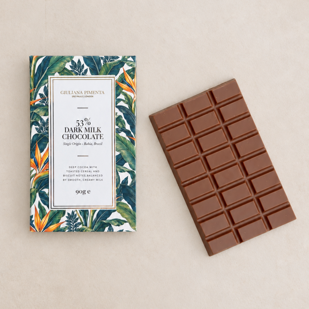 Single origin 53% dark milk chocolate bar unwrapped beside its pack, 90g, handmade in London