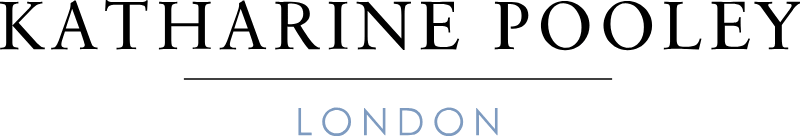 Katharine Pooley London logo with 'KATHARINE POOLEY' in black serif text and 'LONDON' in light blue serif text below on a black background.